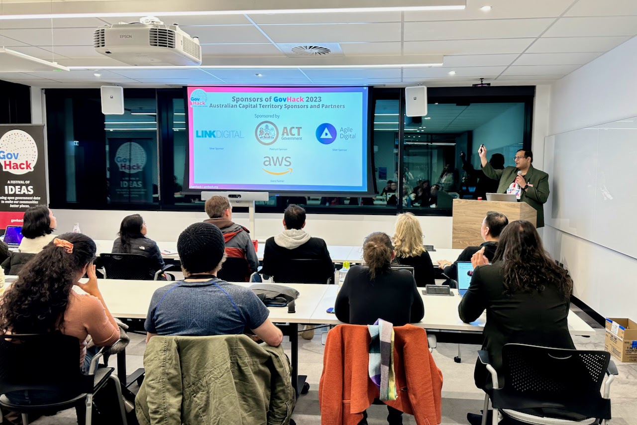 People watching presentation on screen
